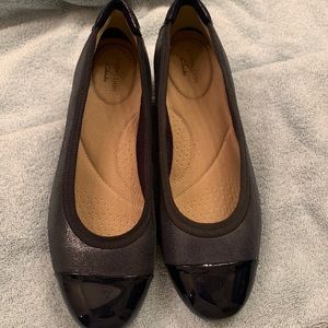 Clark’s navy flats
